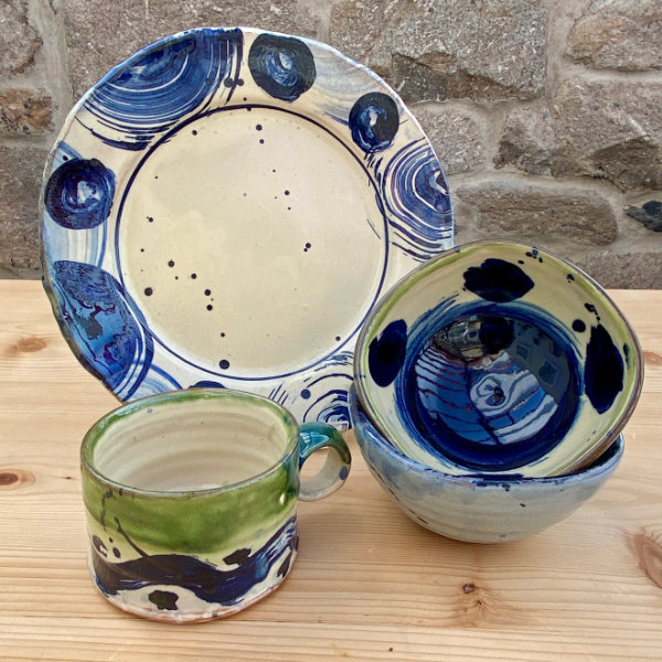 Dinner plate5 £58 – green bowl8, blue 6 £40; mug10 £48